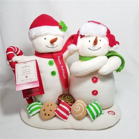 ReLIVE Up and Down Singing Snowman - Santa Hat Snowman Christmas Decoration. . Hallmark snowman by year